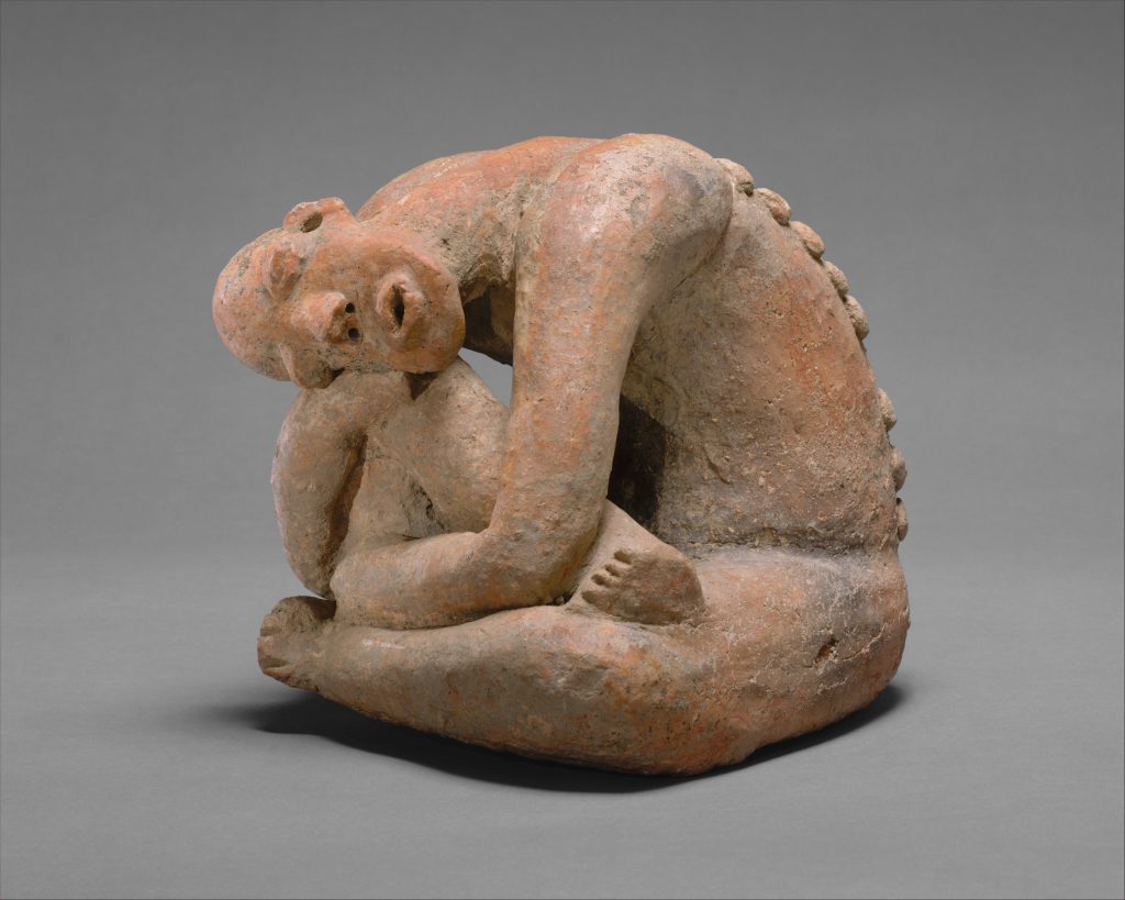 Photo of seated figure sculpture by a middle Niger artist(s), c. 13thC